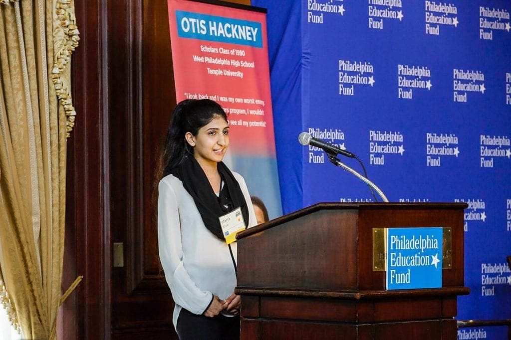 Philadelphia Scholar Maria Khan speaking at podium, during 2019 Educate Philly