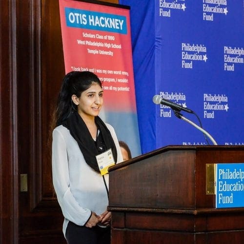 Philadelphia Scholar Maria Khan speaking at podium, during 2019 Educate Philly