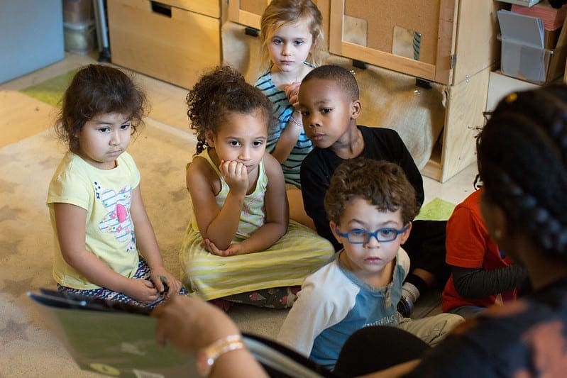 Young children enjoying story time