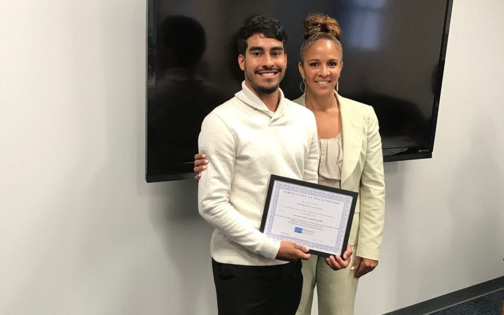 Kim Stephens posing with Philadelphia Scholar, Anthony Santana