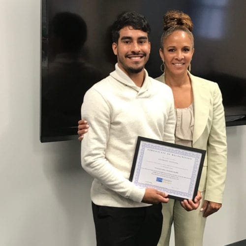 Kim Stephens posing with Philadelphia Scholar, Anthony Santana