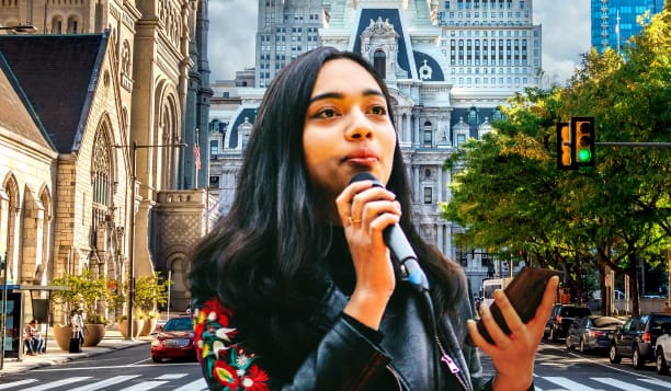 teen girl with microphone holding her phone standing in front of a backdrop of city hall